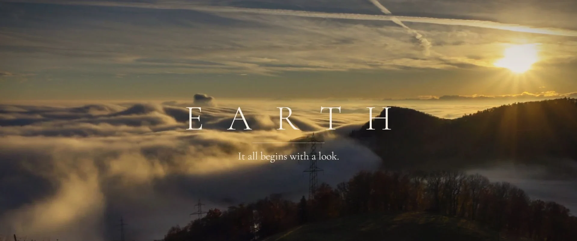End title EARTH over a sea of clouds at sunset